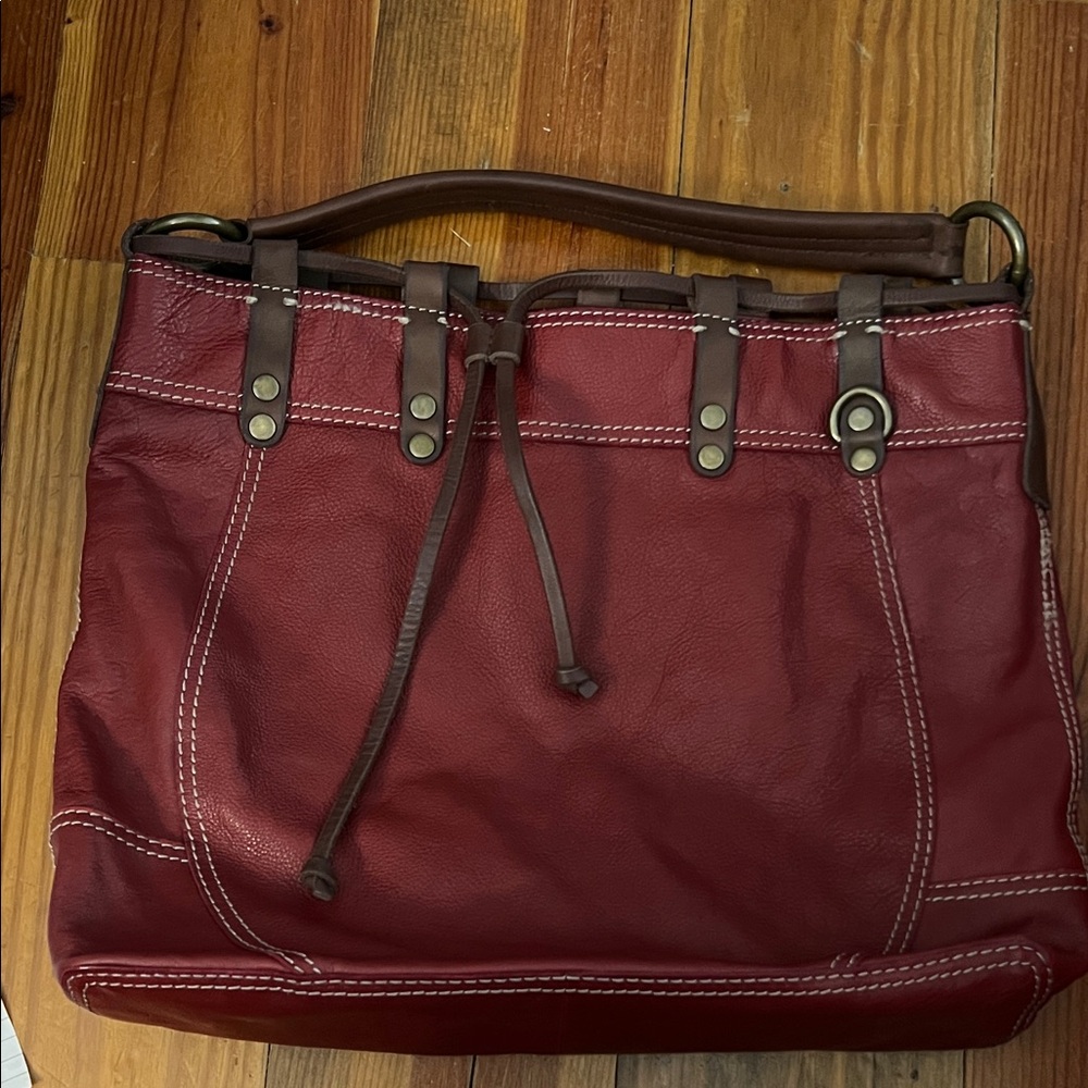 Red Lucky brand leather handbag